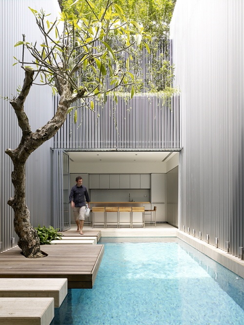 Contemporary Outdoor Living with Pool and Permeable Dining Area