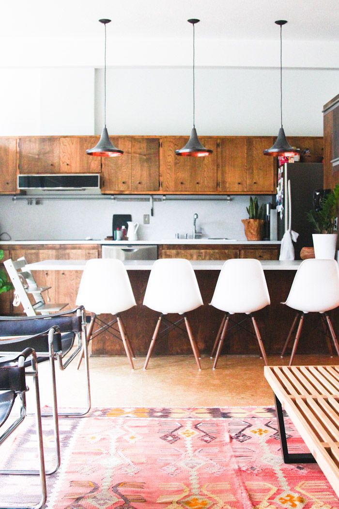 Wood and White Kitchen with Countertop Seating Design