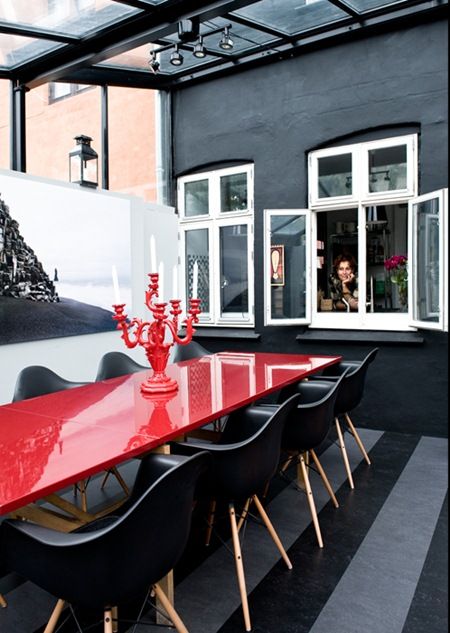Outdoor Dining with Red Table and Black DSW Chairs