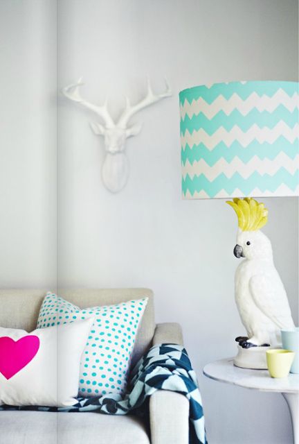 White LIving Room With Animal Art