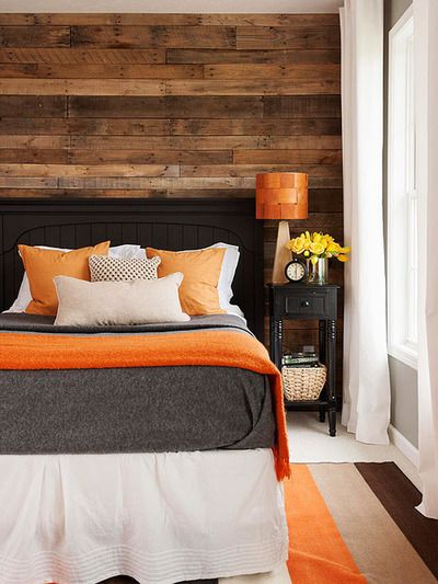 Earthy Masucline Bedroom With Orange Pop